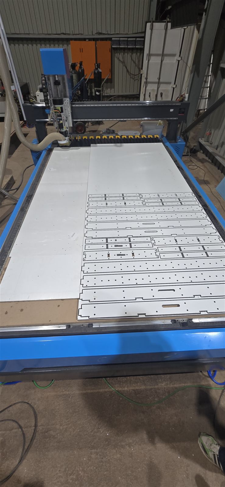 Our CNC router with a full sheet of panel parts