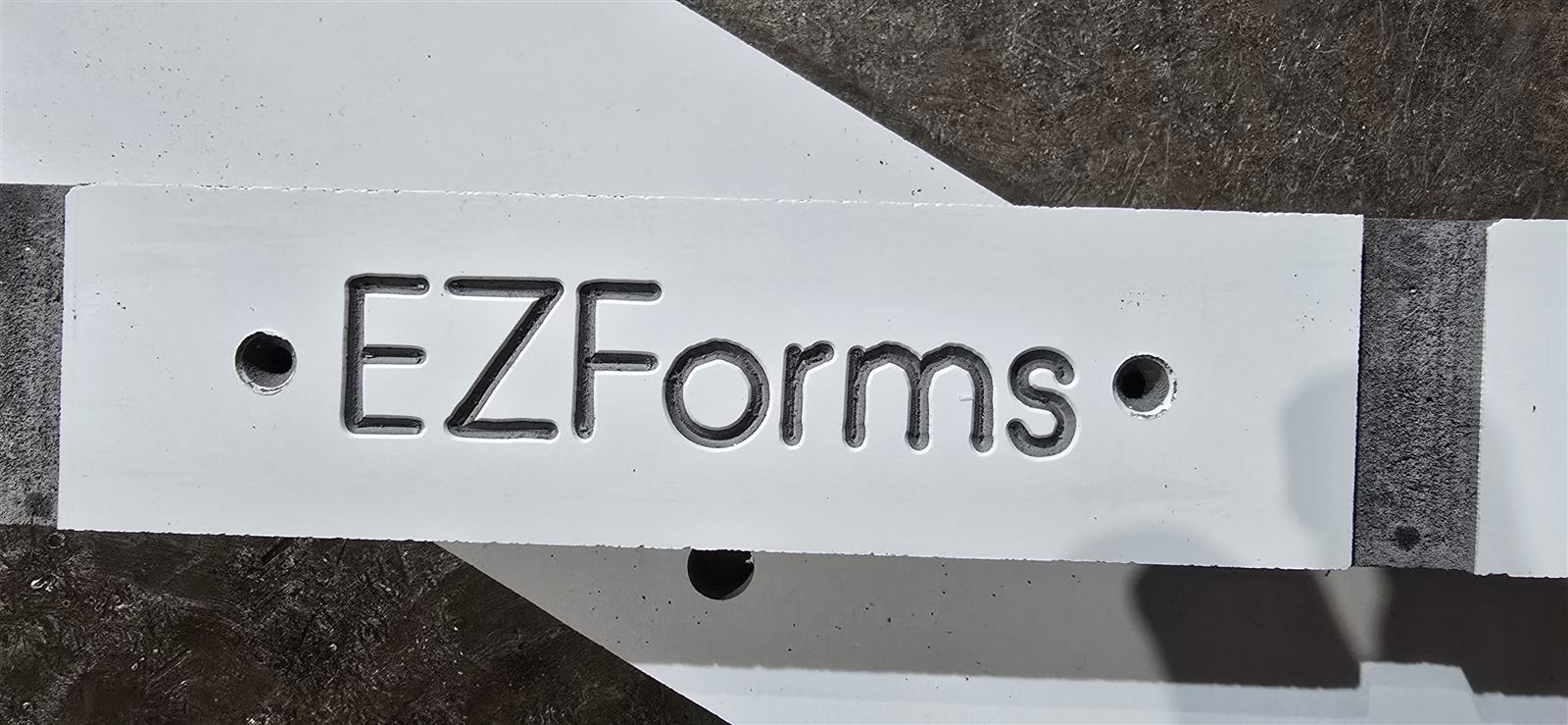 EZForms name engraved into a panel by the CNC router